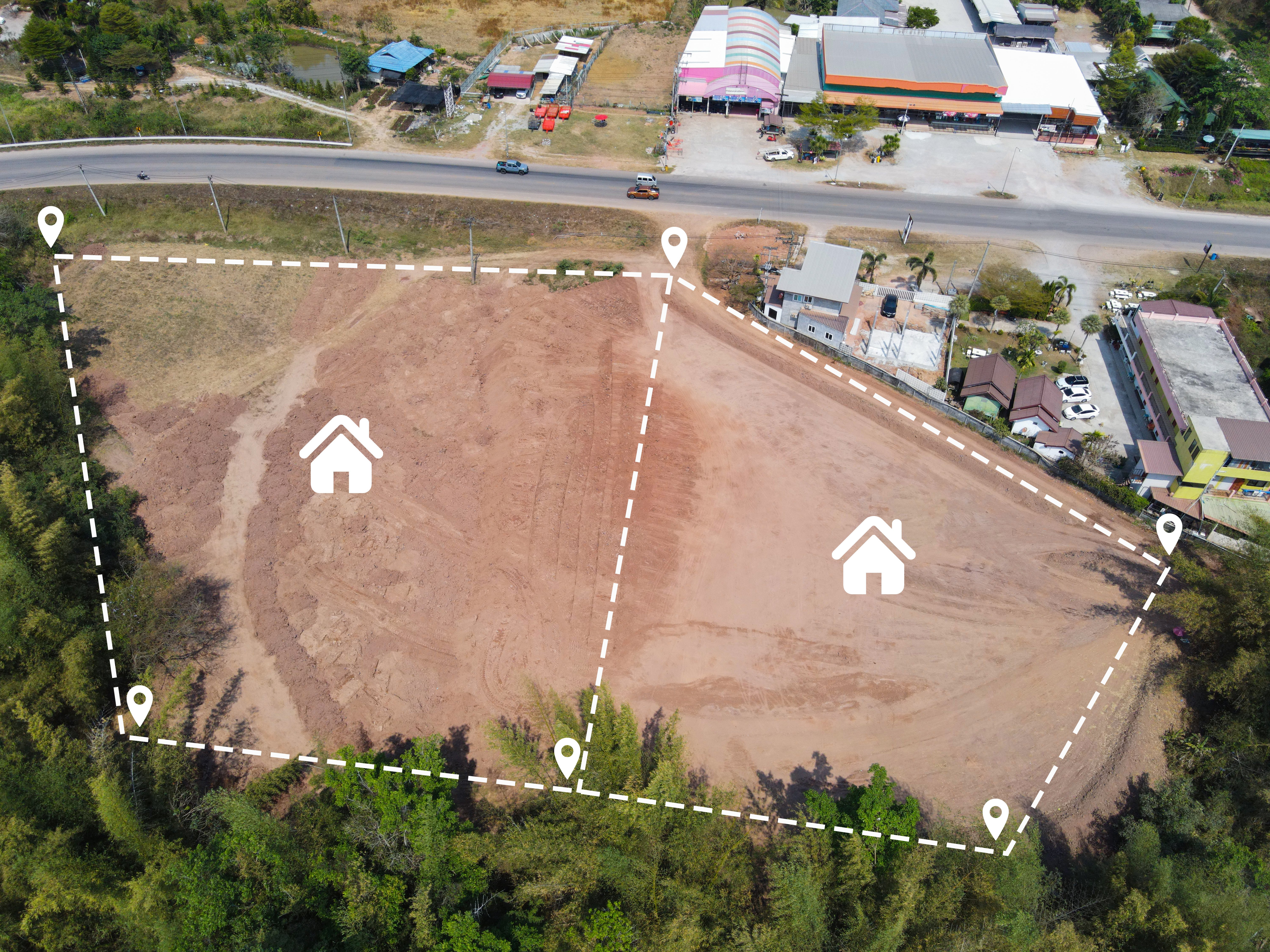 Aerial view of residential lots in development representing a land banking arrangement for a home builder.