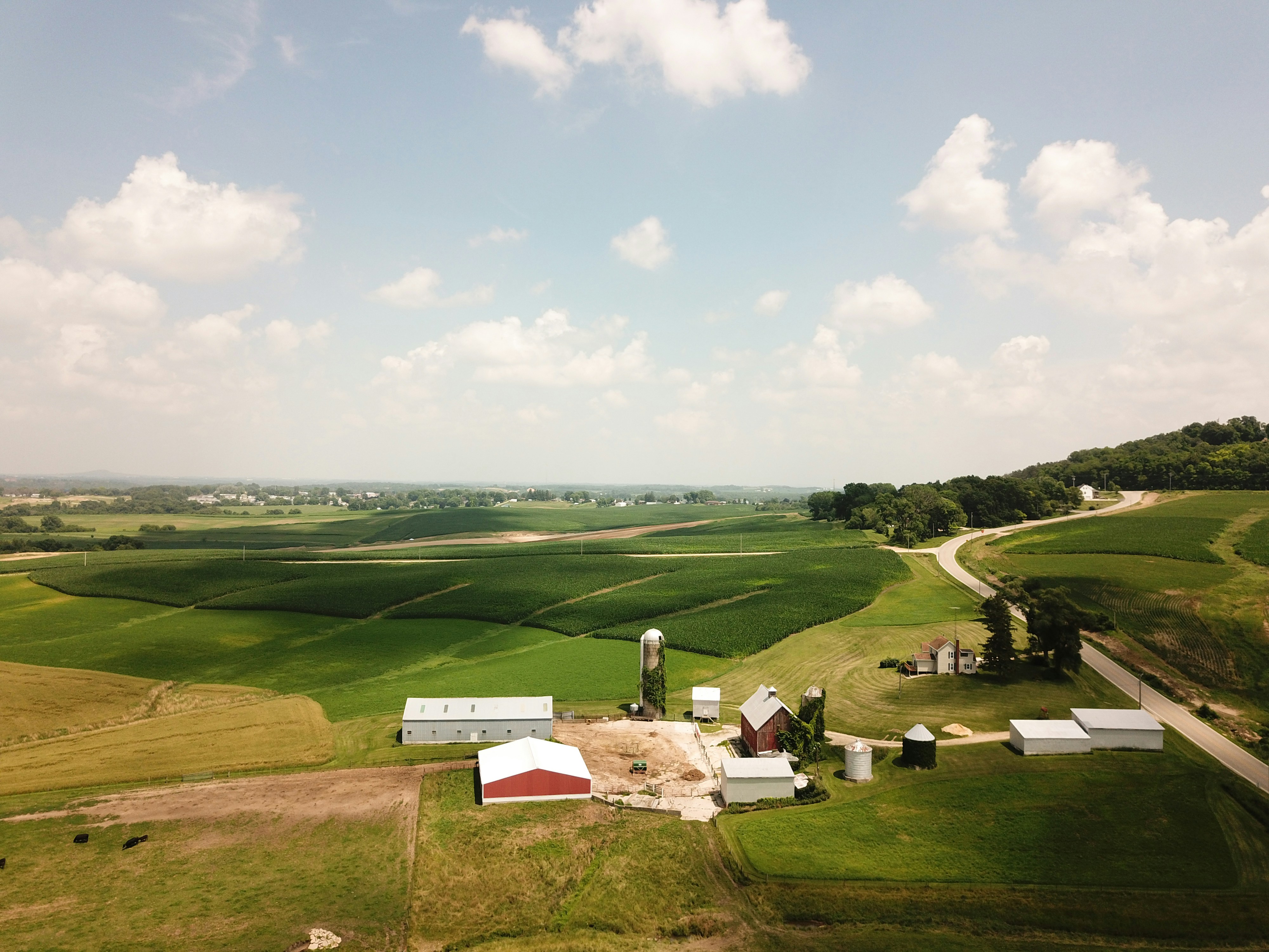 Aerial view of Midwest farmland illustrating the rise of debt-financed farmland purchases analyzed in AEI and Acres research