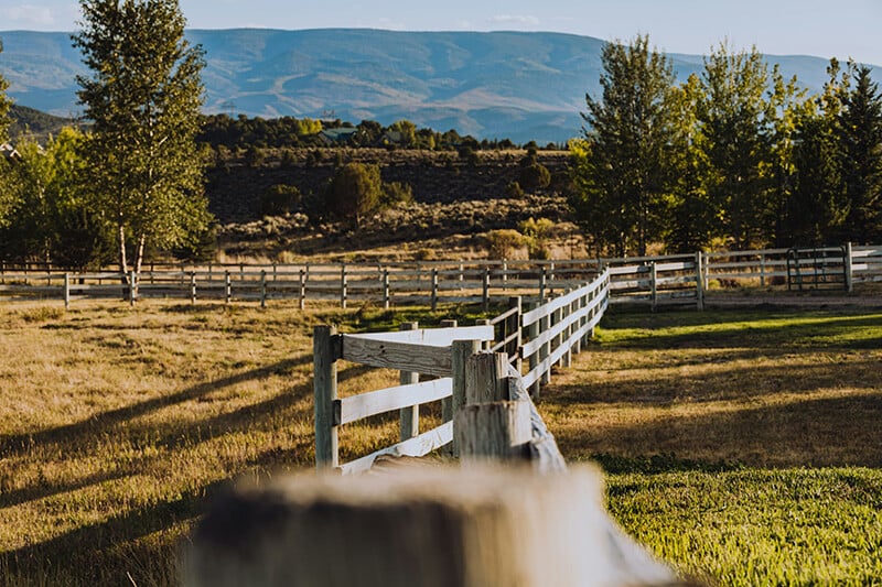 Open rural land parcel illustrating how to buy land step by step — land purchase guide for first-time buyers
